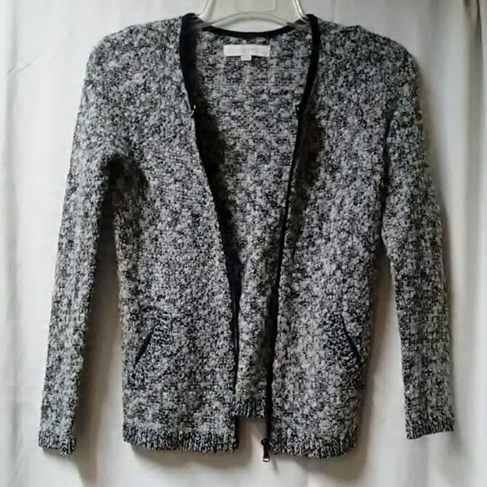 Sweater jacket with pockets.